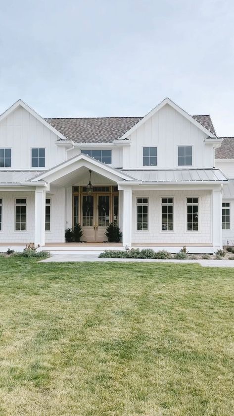 Niña - New House / Home Decor on Instagram: “Check out the black roof and the black metal roof 😍😍!! Looks so good with that white exterior! Beautiful design by @murdockbuildersutah !…” White 2 Story House Exterior, Aesthetic Farmhouse Exterior, White Farm Houses, White House White Windows, All White House Exteriors, White House With White Windows, White House’s, Big White House Farmhouse, House Exterior Farmhouse