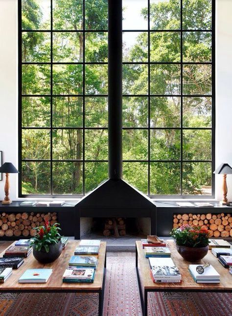 Fireplace in front of large window Design Camino, Minimalist Fireplace, Steel Windows, Big Windows, Modern Fireplace, Design Del Prodotto, Wood Interiors, Trendy Home, Fireplace Design