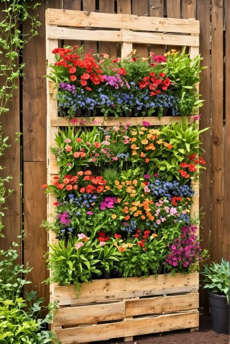 20 Unconventional Pallet Projects For DIY Fanatics Diy Pallet Projects For Outside Gardens, Pallet Yard Art, Planting In Pallets, Diy With Pallets Ideas, Pallet Wall Planter, Pallet Birdhouse, Wood Palette Ideas, Ideas For Pallets, Palate Projects