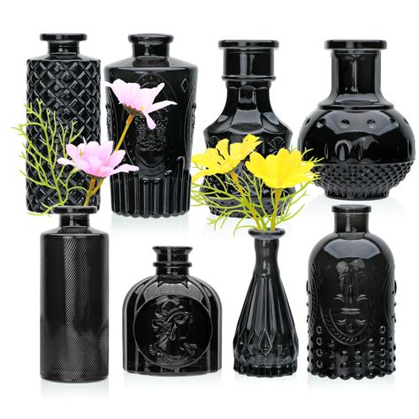 PRICES MAY VARY. PRODUCT MATERIAL：Our black bud vases are made of high quality glass, thick and strong, and not easily broken. These glass vases are beautifully decorated in a vintage style that is also suitable for farmhouse decoration. VINTAGE DESIGN：You get 8 glass bud vase, each small glass vase is decorated with etched patterns to further enhance its attractiveness.They will become a beautiful decorative center on your window sill, dining table or wedding reception table. VARIOUS SHAPES：8 s Black Glass Vases, Black Flower Centerpieces, Black And White Reception Decor, Stitch Bathroom, Black Flower Vase, Mini Vases, Living Room Decorations, Small Glass Vases, Glass Bud Vase