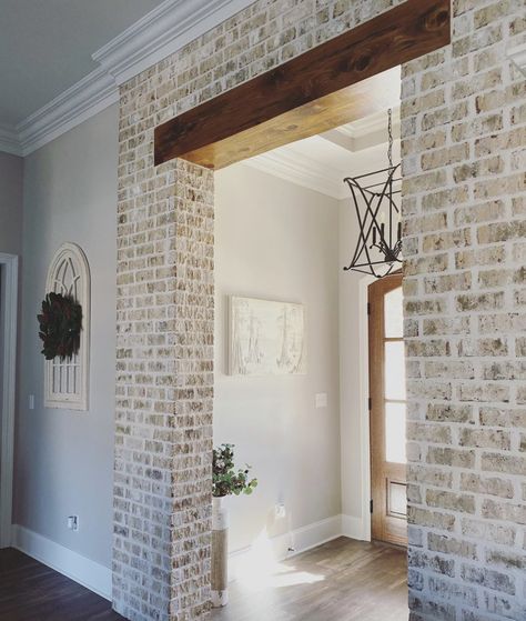 Facebrick Walls Interiors, Brick On Interior Walls, Brick Wall Powder Room, Interior Stone Archway, White Wash Brick Accent Wall, Farmhouse Archway, Interior Brick Archway, Brick Wall Entryway, Brick Entryway Wall