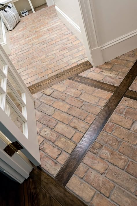 Brick and hardwood Flooring The new entry was outfitted with brick floor set in a diamond pattern and intersected by wooden planks matching the pine of the kitchen floor. The brick runs into the mudroom for a durable and unique surface #brick #hardwoodflooring #mudroom #flooring #floor Wood And Brick Flooring Combination, Brick Paver Floors Kitchens, Unique Kitchen Flooring Ideas, Brick And Wood Flooring, Colonial Flooring, Driveway Tiles, Brick Floors, Mudroom Flooring, Brick Floor