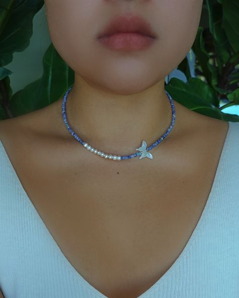 Meet your new summer staple: the Blue Jasper Minimalist Choker Necklace! This beauty combines cool blue jasper beads with a radiant freshwater pearl and a cute butterfly pendant. It’s the perfect piece for layering and adds a playful touch to any outfit. Whether you’re hitting the beach or brunching with friends, this necklace has you covered. And don’t forget to grab the matching bracelet for the ultimate style combo—both available right here in my store! #summervibes #summerjewelry #beaded... Blue Jasper, Cute Butterfly, Matching Bracelet, Jasper Beads, Summer Staples, Butterfly Pendant, Matching Bracelets, Summer Jewelry, Fresh Water