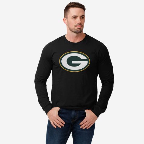 You’re the best fan. You could use a shirt that shows off the ultimate team pride. Look no further than this Green Bay Packers Primary Logo Long Sleeve T-Shirt! Get ready to be the star of every tailgate group picture and MVP of the in-game jumbotron. This top features a design that showcases your all-important team colors and a bold team logo display across the chest, meaning this t-shirt will prove your unmatched dedication to the Green Bay Packers when you’re at the game or watching at home with your friends. In other words, this graphic tee is about to be your new favorite teammate. This Green Bay Packers shirt is made from easy-wearing, comfortable fabric that will make this a regular t-shirt in your rotation. It also boasts a classic construction for the durability you need when you’ Green Bay Packers Shirts, Group Picture, Logo Display, Best Fan, Group Pictures, Green Bay Packers, Green Bay, Team Colors, Easy Wear