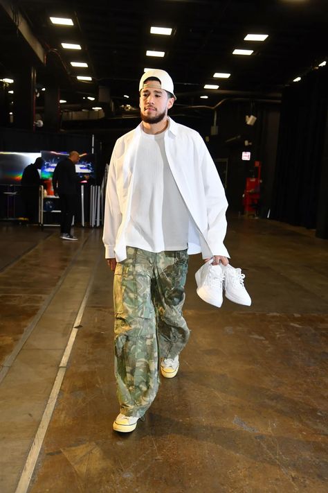 A Look at the Best Fashion Moments From the NBA’s 2024 Season [PHOTOS] Devon Booker, Booker Outfits, Devin Booker Outfits, Camo Pants Outfit Men, Book Core, Camo Pants Outfit, Nba Drip, Hit Or Miss, Men Aesthetic