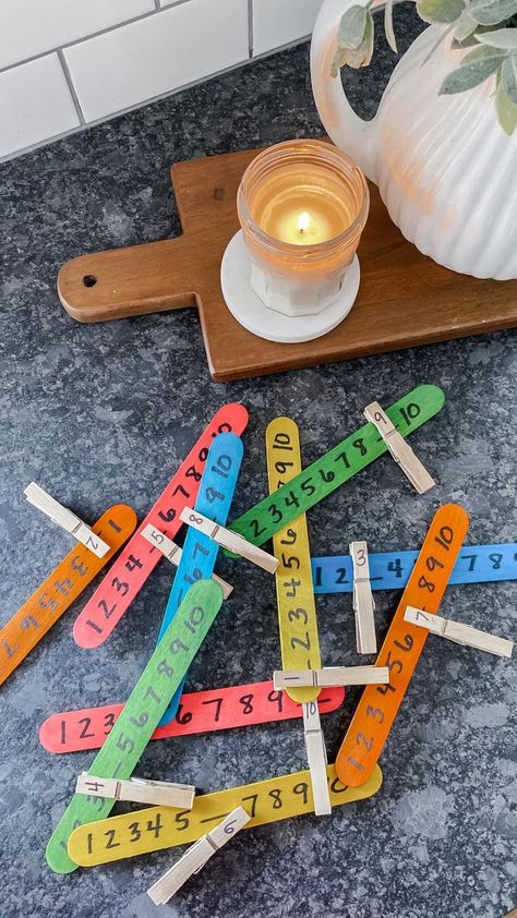 MISSING NUMBER POPSICLE STICKS! 🔢 Counting Fun Unleashed! Get ready for a colorful and exciting math activity that will boost number skills! Using extra jumbo craft sticks (find them on my Amazon Storefront in the Kids Activity Must-Haves section), clothespins, and a permanent marker, watch as your child hones their counting and ordering abilities while practicing dexterity and fine-motor coordination. 🙌🏼 I was so proud of my Roo as she counted each number on the popsicle sticks outloud and f Number Ordering Activities, 2023 Classroom, Maths Activity, Number Crafts, Baby Books Diy, Numeracy Activities, Books Diy, Motor Coordination, Counting For Kids