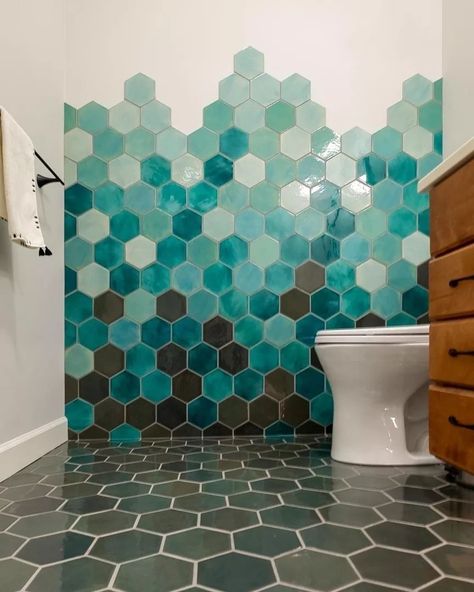 Choose your fighter! Which Hexagon bathroom is your vibe?! 1: Large Hexagons in Vermont Pine - Design by @AndreaSchumacherInteriors 2: Geo-Hex Pattern in 901E Evening Shadow, 22E Blue Opal, and 301 Marshmallow - Design by @Arazi.Design.Studio 3: Large Hexagons - 1036W Bluegrass - Design by @rdstudioinc 4. Large Hexagons in Smoke N Mirrors, 1017E Sea Mist, 1065 Mint Julep, 214 Coastal Breeze Bathroom Ideas Hexagon Tiles Master Bath, Bathroom Highlighter Tiles Ideas, Hexagonal Tiles Bathroom, Bathroom Hexagon Tile, Hex Tiles Bathroom, Hexagon Bathroom, Choose Your Fighter, Mosaic Bathroom Tile, Bathroom Big