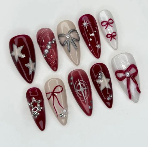 @/nahssira on tt, cute xmas nail set Design Press On Nails, Trendy Nail Art 2024, Red Theme Nails, Cute Xmas Outfits, Alt Christmas Nails, Lovecore Nails, Y2k Christmas Nails, Dark Coquette Nails, Romantic Goth Nails