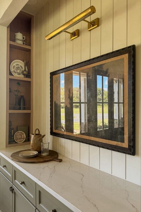 Dining room inspo, picture light, brass, vintage, cottage, cutting board, wood, landscape print, vintage art, wall art, dining nook, wood shelves Picture Light Over Art, Light Above Kitchen Sink, Lighting Above Sink, Dining Room Shelving, Light Over Sink, Antique Glass Mirror, Gallery Light, Library Rooms, Above Kitchen Sink