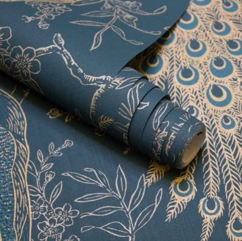 This amazingly regal and elegant wallpaper is part of Rasch's Taste range, which is filled with beautifully designed exquisite wallpapers. This Metallic Peacock Wallpaper Navy glitters with the essence of wild tropical gardens and dignified palaces, which makes it the perfect wallpaper for those spaces which need a little bit of extra opulence and luxury! Although this wallpaper is delicate in its design, it is also a washable wallpaper, which means that you will get not only the delicate elegan Peacock Bedroom, Living Room Wallpaper, Peacock Wallpaper, Washable Wallpaper, Elegant Wallpaper, Downstairs Toilet, Set Sofa, Tropical Gardens, Ideas Living Room