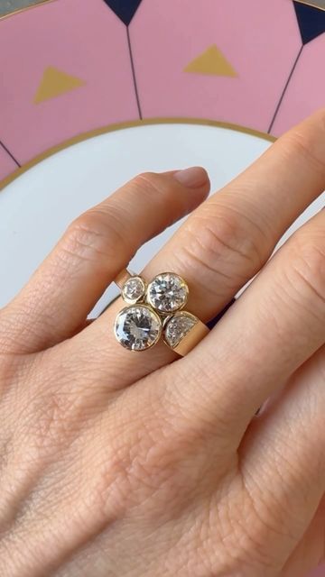 MOCIUN on Instagram: "Heirloom Resetting by Mociun: An refreshed ring with a little secret 🤭 Our client brought in two heirloom stones — both round brilliant natural diamonds weighing a total of ~ 2.30 ct. Caitlin introduced two half moon natural white diamonds and a smaller round brilliant cut diamond. The setting is made of 18k yellow gold with a wide tapered band and a hidden gem on the inside for a refreshed Mociun look. Thank you to our client for your trust ✨

#mociun #diamondring #customjewelry" Hidden Gem, White Diamonds, Round Brilliant Cut Diamond, Half Moon, Brilliant Cut Diamond, Round Brilliant, Diamond White, Custom Jewelry, Natural Diamonds