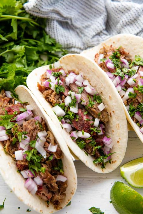 Mexican pork carnitas are given a smokey makeover in this delicious and easy recipe for Smoked Carnitas. These make for one killer taco! Smoked Pork Tacos Mexican, Smoked Mexican Food, Traeger Mexican Recipes, Traeger Tacos, Smoked Taco Meat, Smoked Pork Carnitas Recipe, Smoked Tacos, Smoked Pork Tacos, Smoked Pork Carnitas