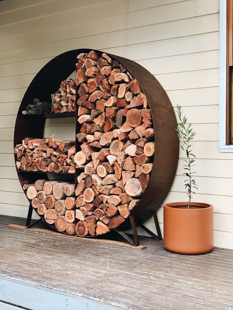 Our custom made metal firewood stacker. A farm house must have 🌿🪵 Steel Firewood Rack, Wood Stackers Firewood Storage, Summer Deck Decor, Landscaping Entrance, Firewood Stand, Stove Decor, Outdoor Firewood Rack, Porch Wood, Firewood Shed