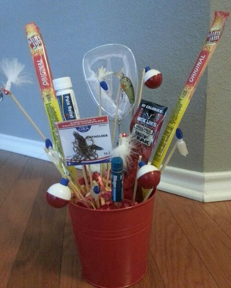 Man gift basket/ man bouquet/ fishing gift Diy Men Gift Baskets, Fishing Easter Basket For Men, Fishing Bouquet, Fishing Easter Basket, Fishing Gift Basket Ideas, Man Gift Basket, Fishing Gift Basket, Fishing Baskets, Easy Gift Baskets