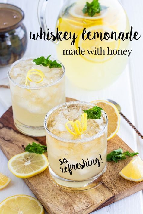 Whiskey lemonade made with homemade lemonade from freshly squeezed lemons, sweetened with honey rather than sugar, and mixed with a shot of whiskey.  It's an easy cocktail to make, refreshing and made in a pitcher so its easy to serve this cocktail to a crowd.  #cookswithcocktails #whiskeycocktail #lemonadecocktail #homemadelemonade #lemoncocktail Whiskey And Lemonade, Pitcher Whiskey Cocktails, Bourbon Lemonade Pitcher, Refreshing Whiskey Cocktails, Whiskey Lemonade Pitcher, Lemon Whiskey Cocktail, Whiskey Cocktails For A Crowd, Cocktail With Lemonade, Bourbon Lemonade Cocktail