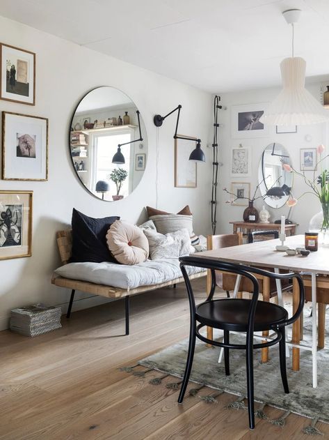 A Scandinavian 1970s Villa Filled With Vintage Decor and Art — THE NORDROOM Ikea Daybed, Kitchen Styles French, Bedroom Photography, Swedish Interiors, Vintage Apartment, Large Round Mirror, 1970s Home, Vintage Interiors, Wooden Dining Tables