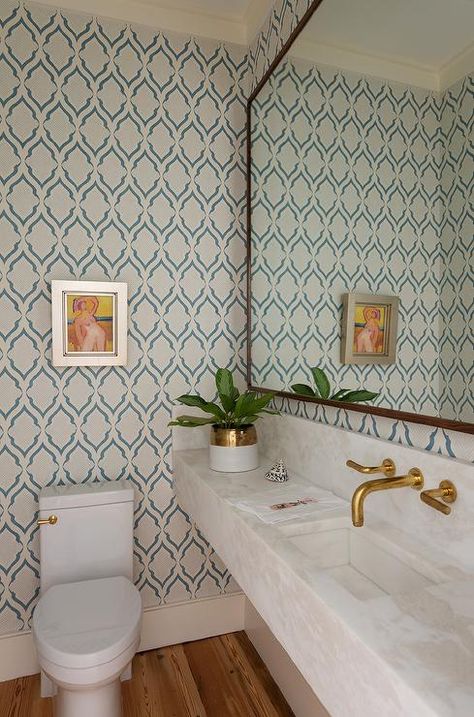 Blue Trellis Wallpaper, White Upholstered Headboard, Dark Stained Wood Floors, Natural Stone Backsplash, Antique Brass Faucet, Christopher Farr, Bathroom Sink Design, Floating Sink, Powder Room Wallpaper