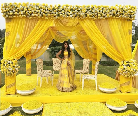 Yellow elegant mehendi stage! | Zowed #zowed #indianwedding #indianbride #mehendisetup #mehendistage #yellowstage #floralsetup #decorideas Ceremony Decorations Outdoor, Wedding Ceremony Decorations Outdoor, Haldi Decor, Wedding Setup, Wedding Hall Decorations, Fun Wedding Decor, Desi Wedding Decor, Mandap Decor, Marriage Decoration