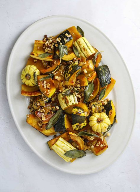 Sweet and savory winter squash roasted with maple syrup and drizzled with nutty brown butter, crispy sage, toasted hazelnuts, and golden raisins. Trust me, this easy recipe is about to become your go-to fall side dish! Craving California, Squash Roasted, Savory Bread Puddings, Ginger Molasses, Brown Butter Sauce, Autumn Side Dishes, Ginger Molasses Cookies, Cranberry Sauce Homemade, Molasses Cookies