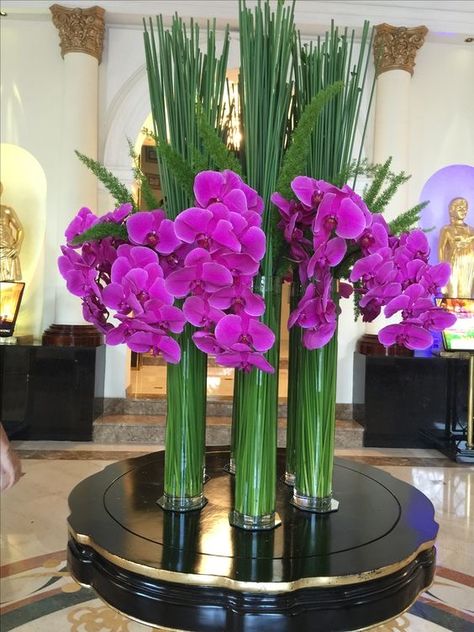 Modern Tropical Floral Arrangements, Hotel Flowers Lobby, Hotel Lobby Flowers, Lobby Flowers, Tall Vase Arrangements, Flowers Arrangements Ideas, Hotel Flower Arrangements, Tropical Floral Arrangements, Hotel Flowers