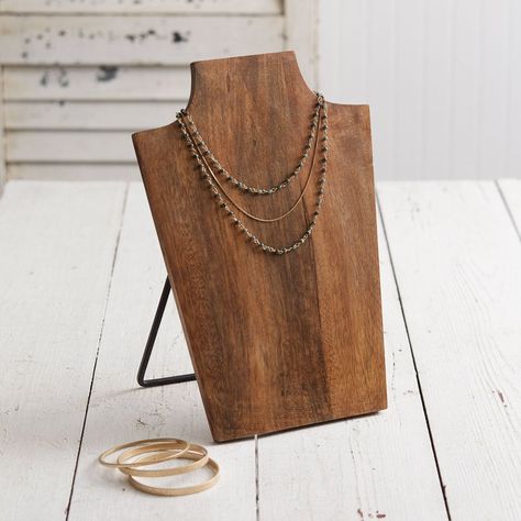 Display a statement piece for decoration or organize your jewelry with this wooden necklace bust. It is made of a carved wood and stands with a metal famed base. Measurement: 8¼''W x 5½''D x 11½''H Necklace Stand, Necklace Organizer, Necklace Display, Wooden Necklace, Wood Necklace, Jewelry Stand, A Metal, Jewelry Holder, Wooden Jewelry