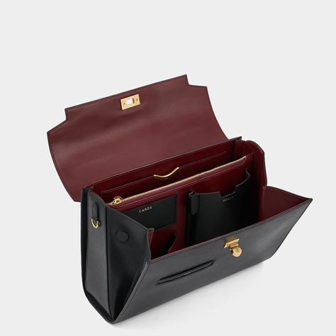 The Mortimer bag is beautifully crafted, inside and out. It is handmade in Florence from the finest, black-hued leather, selected for both its gleam and durability. It has several compartments – one zipped, another with our handmade gold 'lip' – with pockets for your phone, cards, earphones and pen. Carry it by the top handle or style it cross-body by the optional long strap. Item number: 5050925183574 Inside Pockets Bag, Bag Strap Ideas, Luxury Leather Bag, Gold Lips, Phone Cards, Fancy Bags, Classic Bags, Cross Bag, Anya Hindmarch