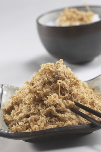 Rousong (pronounced [ɻôusʊ́ŋ]; Chinese: 肉鬆; Cantonese Yale: yuk6 sung1), also known as meat wool, meat floss, pork floss, flossy pork, pork sung or yuk sung, is a dried meat product with a light and fluffy texture similar to coarse cotton, originating from China.[1] Rousong is used as a topping for many foods, such as congee, tofu, and savoury soy milk. It is also used as filling for various buns and pastries, and as a snack food on its own. Rousong is a very popular food item in Chinese cuisin Meat Floss, Nissin Cup Noodles, Pork Floss, Dried Meat, Taiwanese Cuisine, Milk It, Popular Food, Fluffy Texture, Cup Noodles