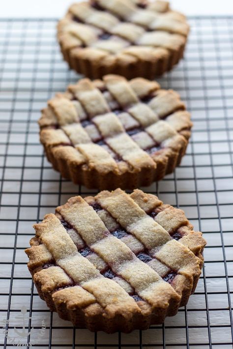 Miniature Linzer Torte | The Beach House Kitchen Linzer Torte Recipe, Mini Christmas Desserts, Desserts From Around The World, Linzer Tart, Traditional Christmas Desserts, Beach House Kitchen, Desserts Around The World, Almond Benefits, Delicious Christmas Desserts