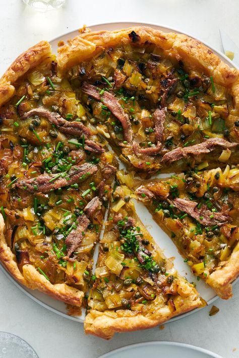 Onion Tart With Leeks, Capers and Anchovy Recipe - NYT Cooking Onions Recipes, Summer Pizza, Anchovy Recipes, Anchovy Paste, Savory Tarts, Onion Tart, Paste Recipe, Savory Tart, Tart Recipe