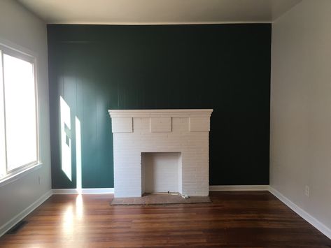 White Fireplace Green Wall, Green Wall White Fireplace, Dark Green Accent Wall Living Room, Emerald Green Living Room, Green Accent Wall, How To Start Painting, Teal Accent Walls, Dark Wooden Floor, Green Painted Walls