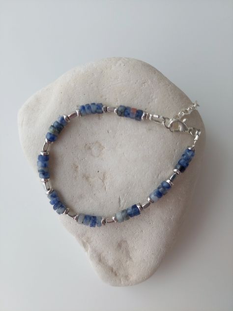 Light blue bracelet/ Sodalite bracelet/ Hematite beads bracelet/ Healing Gemstone Bracelet/ handmade beaded bracelet/ Delicate bracelet/ Minimalist bracelet Wrist bracelet made of small (2x4 mm) sodalite beads and silver colour hematite beads . The bracelet is very unusual and beautiful. The gem suitable for those diagnosed with abnormalities in the liver, pancreas, bladder and kidneys. Wearing it allows you to normalize the activity of the lymphatic system, neutralize the negative effects of ra Bone Tissue, Light Blue Bracelet, Sodalite Bracelet, Seed Beads Bracelet, Radiation Exposure, Healing Gemstone Bracelets, Bracelet Wrist, Wrist Bracelet, Bracelet Minimalist