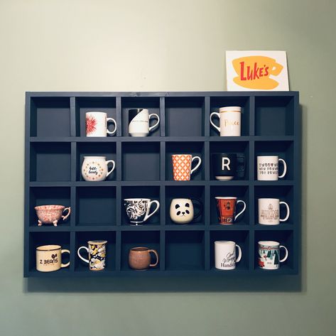 My husband made me a beautiful mug cabinet - and the best part is that it looks a lot like the ones in Luke’s Diner in #gilmoregirls ☕️ #coffee #coffeemugs #diy #homeprojects  #gilmore Coffee Mug Cabinet, Mug Cabinet Display, Coffee Bar Mug Display, Diy Mug Shelf, Mugs Display Ideas, Diy Coffee Mug Display, Mug Organization Cabinet, Mug Display Ideas, Mug Storage Ideas