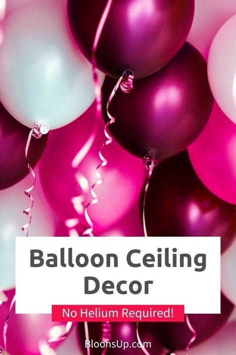 Step into a world of enchantment with balloons hanging from the ceiling! Uncover the magic of crafting this stunning decor yourself without the need for helium. Discover techniques from simple glue dots to advanced structures with quicklink balloons. Ready to elevate your celebrations? Balloons Without Helium Decoration, How To Hang Balloons From Ceiling, How To Decorate With Balloons No Helium, Hang Balloons From Ceiling, How To Hang Balloons On Wall, Hanging Balloons From Ceiling, Birthday Ceiling Decorations, Balloons From Ceiling, Balloon Ceiling Decor