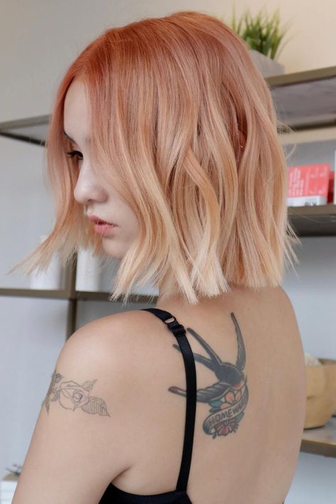 Woman with an ombre peach hair style. Apricot Crush Hair Color, Peach Toned Hair, Peach And Brown Hair, Hair Color Peach, Peach Blonde Hair, Salmon Hair, Peach Hair Color, Apricot Hair, Shadow Roots