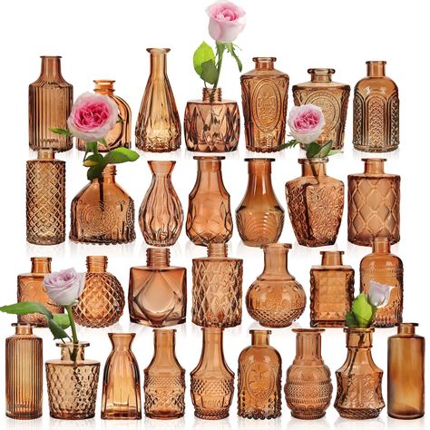 PRICES MAY VARY. Textured:These amber bud vases are made of high quality thick and strong glass, which are durable and not easy to break Sturdy:The small vases for flowers have a stable center of gravity and are not easy to tip over.Each beautiful mini vase has a different design, size, and shap Beautiful present:On Mother's Day, Thanksgiving Day,Valentine's Day, anniversary,Christmas,birthday or Housewarmings,you can give it as a great present to your guests Decorative centerpieces:Decorative v Terracotta Centerpieces Round Table, Amber Wedding Decor, Mexican Wedding Table Decor, Fall Centerpieces For Table Wedding, Simple Fall Centerpieces For Table, Bee Themed Wedding, Decorative Centerpieces, Fall Wedding Table Decor, Centerpieces Rustic