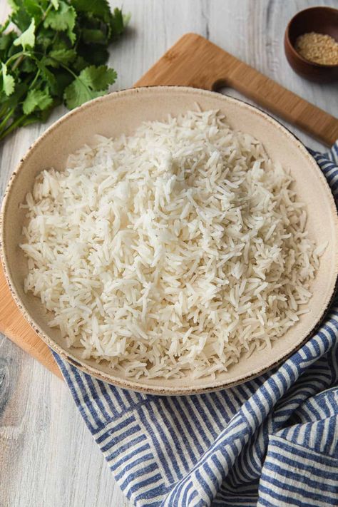 If you're looking for the perfect basmati rice, look no further than this instant pot basmati rice recipe! No more sticky, gluey, or clumpy bits, just separate grains that will make the best fried rice. Includes instructions for the stove top too! Basmati Rice Soup, Instant Pot Basmati Rice, The Best Fried Rice, Best Fried Rice, Basmati Rice Recipes, Rice On The Stove, Cooking Basmati Rice, Indian Rice Recipes, Best Instant Pot Recipes