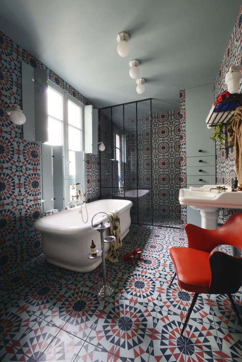 A Madcap Apartment in Paris for a Creative Couple (Plus Kids) - Remodelista Funky Bathrooms, Nyc Townhouse, Mini Bad, Moroccan Bedroom, Apartment In Paris, Moroccan Tiles, Bathroom Remodel With Tub, Paris Apartments, Free Standing Bath Tub