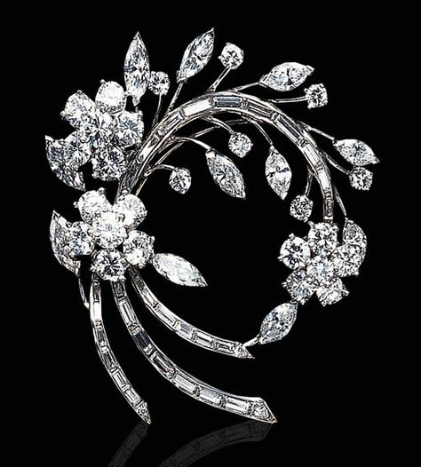 A DIAMOND AND PLATINUM BROOCH   Designed as a circular and baguette-cut diamond floral spray, accented by marquise-cut diamond leaves, mounted in platinum Bijoux Art Nouveau, Diamond Solitaire Earrings, Barbie Vintage, Floral Spray, Diamond Brooch, Vintage Jewels, Silver Gifts, Baguette Cut, Diamond Jewellery