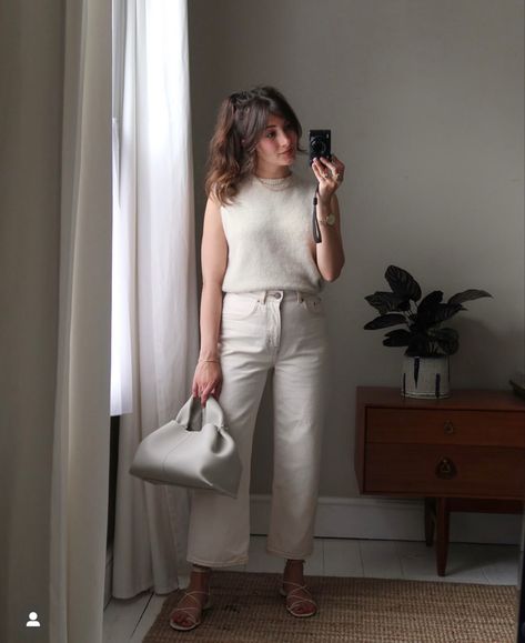 Outfit inspo  a white sleeveless knit and straight leg cream jeans with white strappy sandals and a white bag Daily Minimal, Minimal Street Style, All White Outfit, Summer Lookbook, Beauty Shoot, White Outfit, Photography Portfolio, White Outfits, Lifestyle Photographer