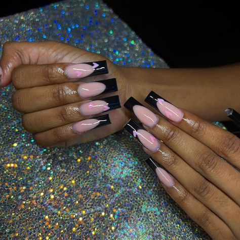 @nailsgetlaid on IG. Long black french tips with pink hearts #frenchtipnails #frenchnails #nailideas #nailinspiration #nailinstagram #blackfrenchtips #instagramnails Black French Tip Nails Pink Base, Black French Tips With Pink, Pink And Black French Tip Nails, French Tips With Pink, Black French Tip Nails, Black French Nails, French Tip Acrylics, Black French Tip, Black French Tips