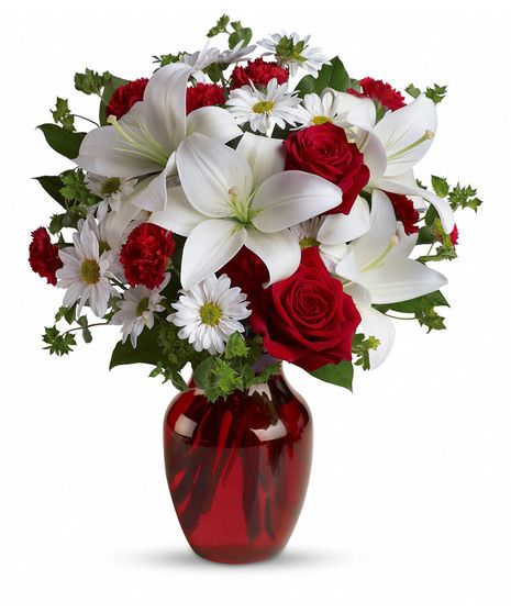 The spirit of love and romance is beautifully captured in this enchanting bouquet. It's the perfect gift for anyone you love.
 Teleflora SKUs: ,T128-2A,T128-2B,T128-2C Valentines Day Floral Arrangements, Vase Flower Arrangements, White Flower Vase, Love Bouquet, Red Roses Bouquet, Winter Floral Arrangements, Birthday Flowers Bouquet, Red Vase, Valentine Bouquet