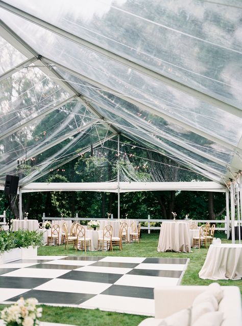 Black and white checkered dance floor and cocktail style seating under a clear top tent Clear Frame Tent Wedding, Black And White Checkered Floor Wedding, Black And White Checkered Dance Floor, Black And White Dance Floor Wedding, Checkered Dancefloor, Checkered Dance Floor Wedding, Clear Top Tent Wedding, Clear Tent Wedding, Cocktail Style Wedding