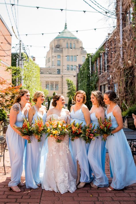 Bridal bouquet, orange and blue wedding, ranunculus, tulip, carnations, poppy, feverfew, tweedia, Italian ruscus, sword fern, eucalyptus, dusty blue ribbon, Bridesmaids, orange snapdragons, bridesmaid bouquets, light blue dress, Spring wedding, summer wedding, The Venue CU, Champaign-Urbana wedding, Illinois wedding, central Illinois wedding, midwest wedding, wedding flowers, J.Blu Design, Peoria wedding, T&B Photography, bridal party, bridesmaid dresses, colorful bouquet, wedding bouquet, bride Blue Orange Bridesmaid Dresses, Blue And Orange Bridesmaid Dresses, Snapdragon Bouquets, Light Blue And Orange Wedding, Orange Snapdragon, Orange Blue Wedding, Blue Tweedia, Blue Yellow Weddings, Urbana Illinois