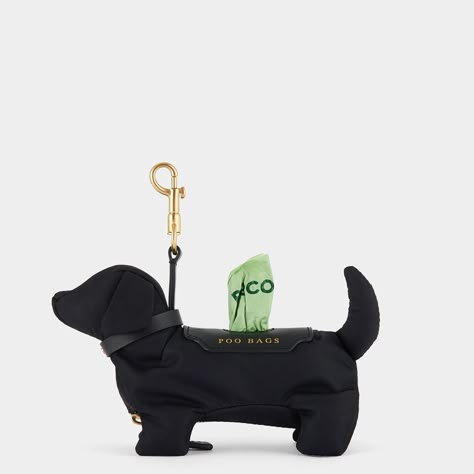 Let’s be honest, there isn’t anything glamorous about taking care of your dog’s, shall we say, business, but this handy poo bag charm introduces a little adorable fun to proceedings. Designed to hold your collection of bags, it has a zip fastening and an open slot at the top alongside a clip. Secure it to your bag or even your coat to keep those necessities close when nature calls. Item number: 5050925162562 Dog Poo, Dog Poo Bags, Dog Business, Dog Charm, Dog Rooms, Dog Clip, Poop Bag Holder, Dog Charms, Anya Hindmarch