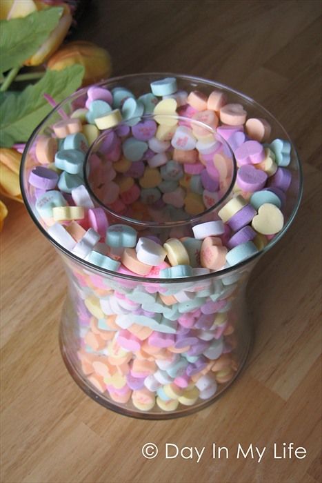 Take two different size vases and sprinkle candy hearts between them and voilà: the perfect centerpiece for your Valentine's Day Cheap Vases, Vase With Flowers, Candy Hearts, My Funny Valentine, Take Two, Valentine Day Crafts, Valentines Day Decorations, Heart Candy, Valentine Crafts