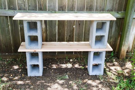 This is such a simple project, and it's actually kind of a classic from 80's college dorms, but if you plop some plants on it, suddenly it looks a lot more chic and fits right into your backyard! I love these shelves to hold flowers, herbs, and gardening tools! You can see this project and more easy and affordable DIY ideas on my blog,  Love & Renovations Start by grabbing two of your cinder blocks and laying them out where you're working about 3 feet apart from one another. I highly r… Cinder Block Shelves, Large Wooden Planters, Woodworking Studio, Cedar Planter Box, Planter Project, Cinder Blocks, Recycle Timber, Diy Planter Box, Plant Stands Outdoor