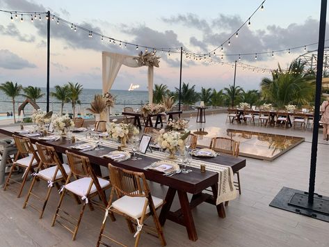 #rooftop #reception #bamboochairs #dancefloor #wedding Sandals Resort Wedding Reception, Rooftop Reception Wedding, Rooftop Beach Wedding, Oceanfront Wedding Reception, Dreams Natura Cancun Wedding, Roof Top Wedding Ceremony, Dreams Riviera Cancun Wedding Reception, Beachside Wedding Reception, Cancun Wedding Reception