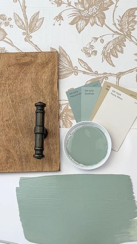 Sherwin Williams's Halcyon Green is a subdued, versatile green that blends calming blue undertones with a hint of gray.  Halcyon Green bridges the gap between a nature-inspired green and a more stately, traditional blue, making it a unique choice for those looking to introduce a refined yet down-to-earth color in their decor.  The color can vary in appearance throughout the day, skewing greener in bright sunlight and revealing more of its blue-gray character in the evening or in spaces with less natural light.   It pairs beautifully with light, sandy neutrals for a beachy, relaxed vibe, or with darker wood finishes for a more grounded and traditional atmosphere. Light Grey And Green Bathroom, Halcyon Green Sherwin Williams Cabinets, Sherwin Williams Blue Green Paint Colors, Halycon Green, Halcyon Green Sherwin Williams, Green Paint Sherwin Williams, Blue And Green Interior Design, Sherwin Williams Halcyon Green, Green Paint Ideas