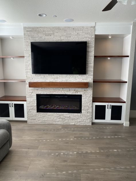 Electric Fireplace Ideas With Tv Stone, Rock Wall With Build In Tv And Fireplace, Electric Fireplace With Stone, Fireplace Tv Wall Playstation, Stone Wall Fireplace With Tv, Mount Tv Brick Fireplace, Stone Wall Fireplace With Tv Corner, 75 Inch Tv On Wall Ideas, Drywall Entertainment Center With Fireplace