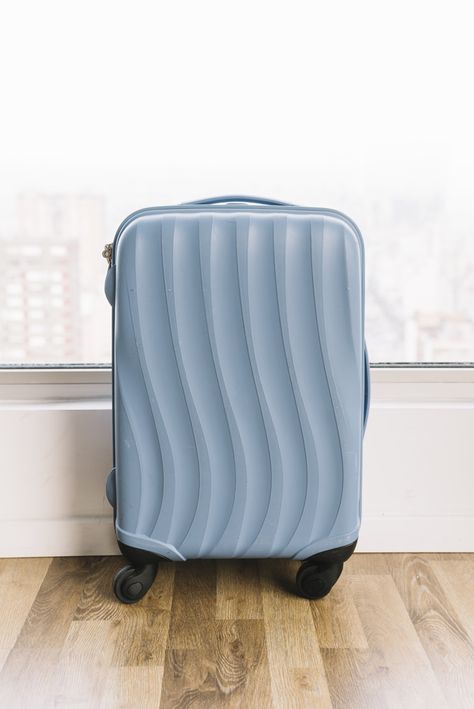 Blue travel suitcase near the window on ... | Free Photo #Freepik #freephoto Ariana Grande Anime, Blue Suitcase, Travel Suitcase, Retro Camera, Urban Park, Long Shot, Wooden Floor, Suitcase Traveling, Woman Standing